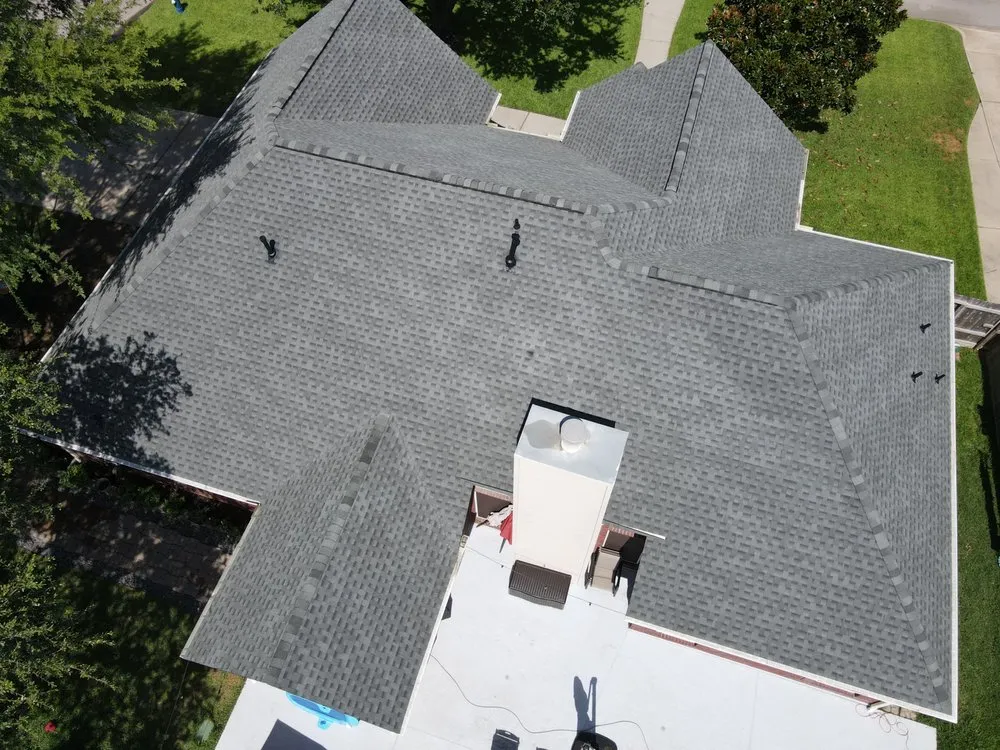 Slide of Core Four Roofing