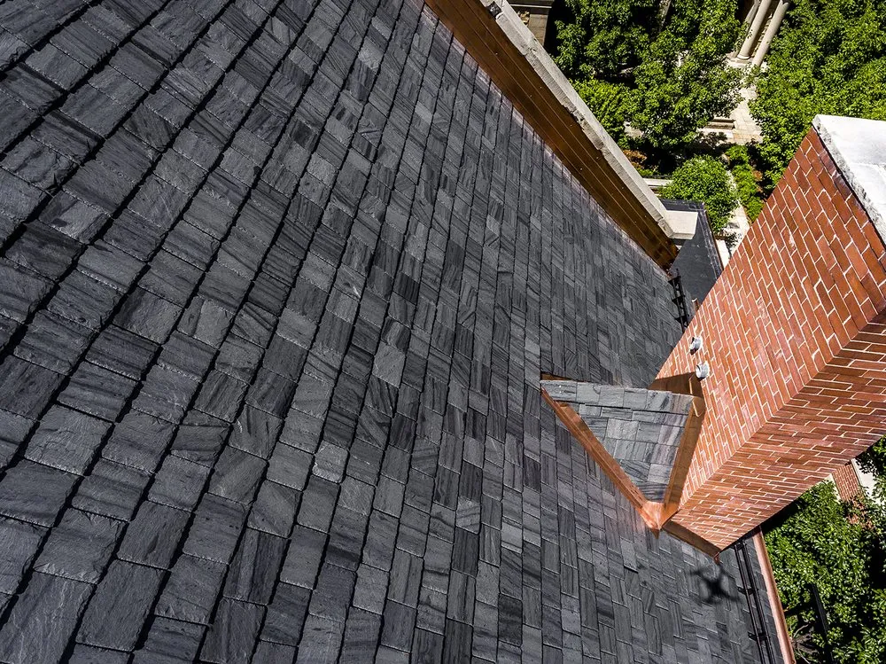 Slide of Core Roofing + Solar