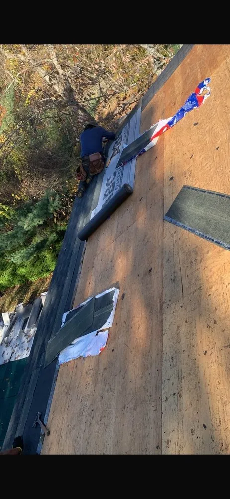 Emergency roof leak repair in Oakland Gardens, NY - Corey Roofing and Siding