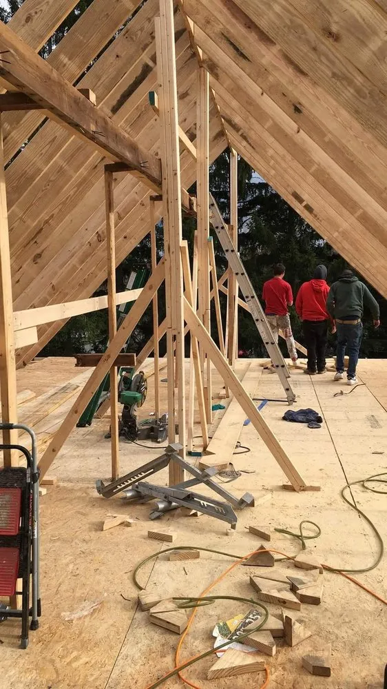 Slide of Corey's Quality Roofing