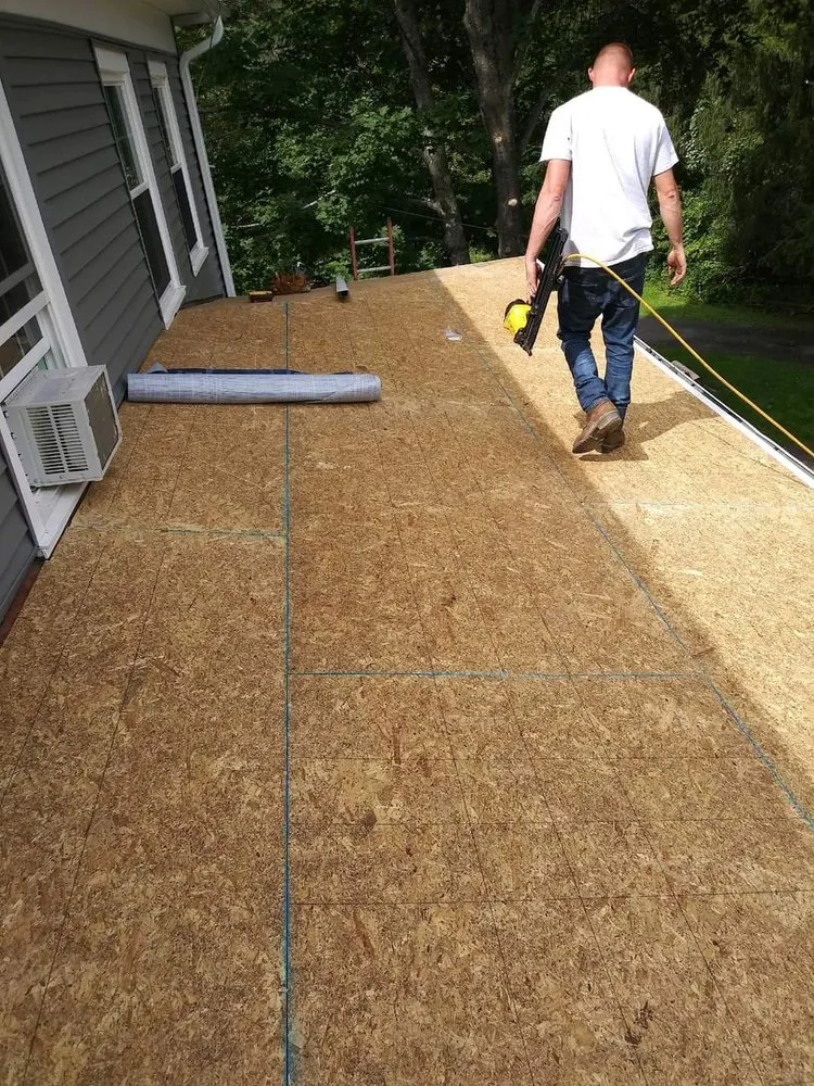 Slide of Corey's Quality Roofing