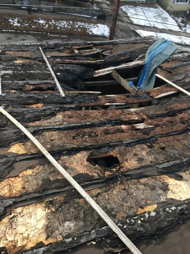 Slide of Corey's Quality Roofing