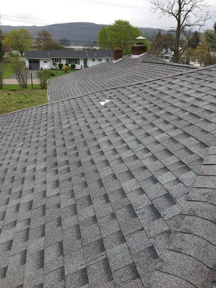 Slide of Corey's Quality Roofing