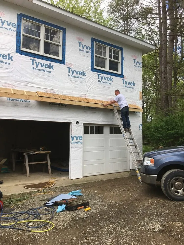 Slide of Corey's Quality Roofing