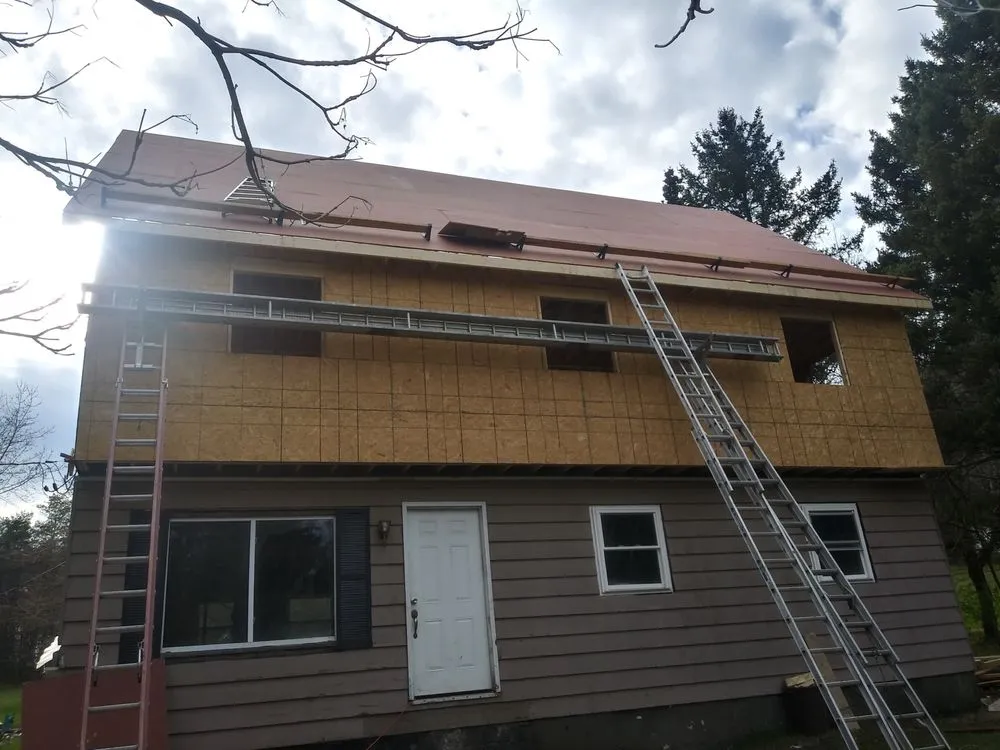 Slide of Corey's Quality Roofing