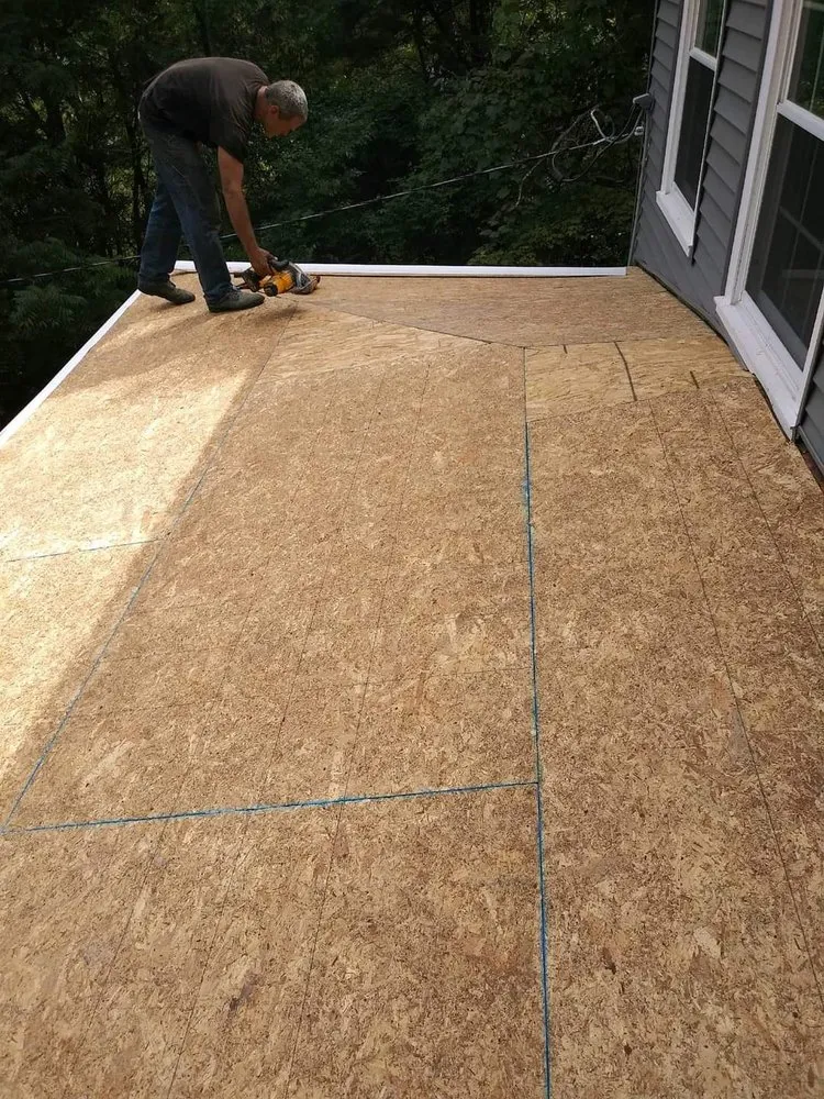 Slide of Corey's Quality Roofing