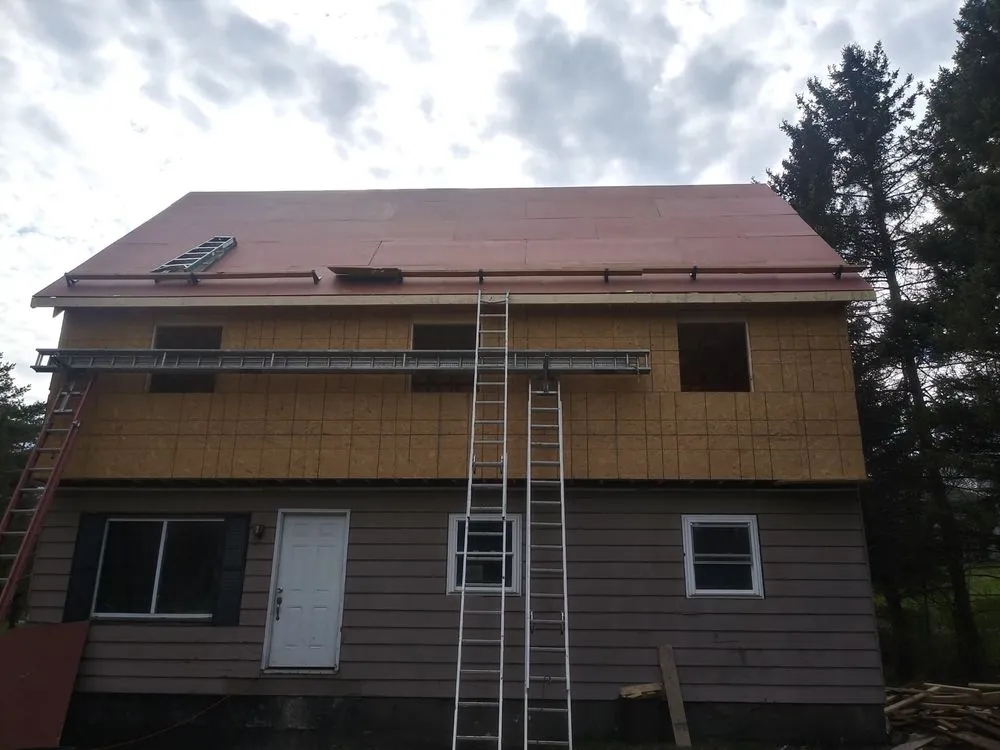 Slide of Corey's Quality Roofing