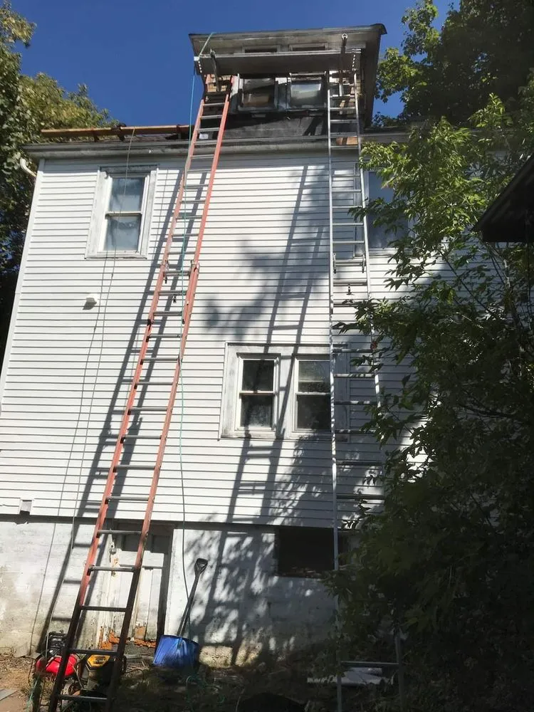 Slide of Corey's Quality Roofing