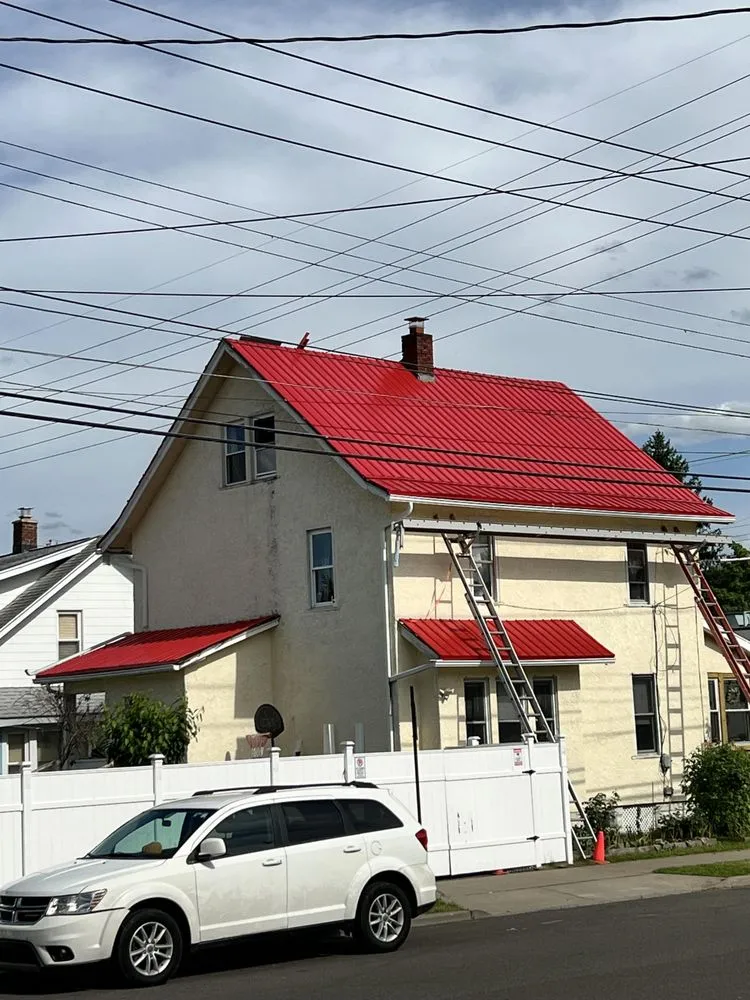 Slide of Corey's Quality Roofing