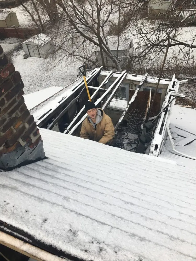 Slide of Corey's Quality Roofing