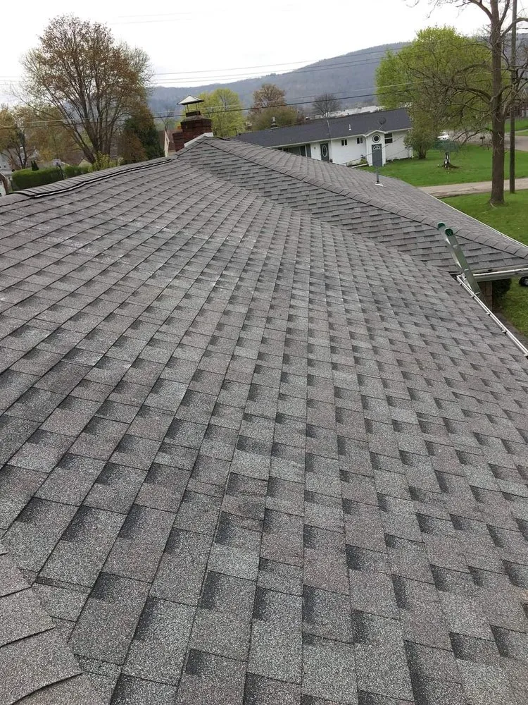 Slide of Corey's Quality Roofing