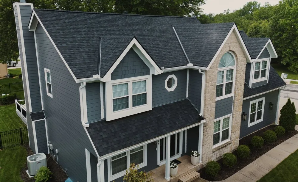 Slide of Corner House Roofing