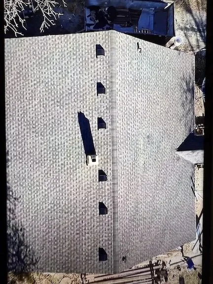 Slide of Corner House Roofing