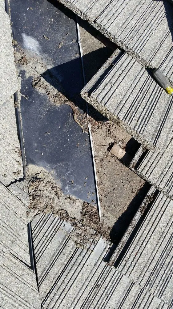 Slide of Cortes Roofing