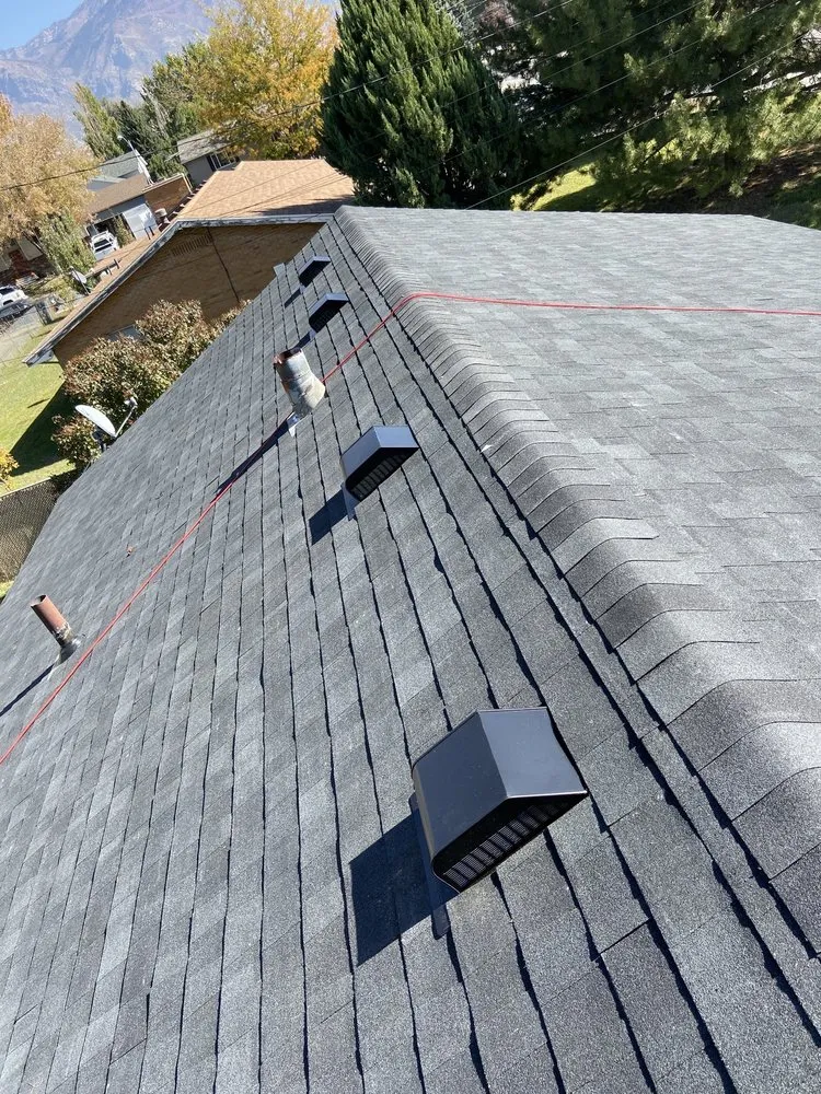 Slide of Corvid Roofing