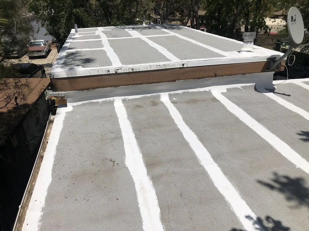 Slide of Costa Roofing