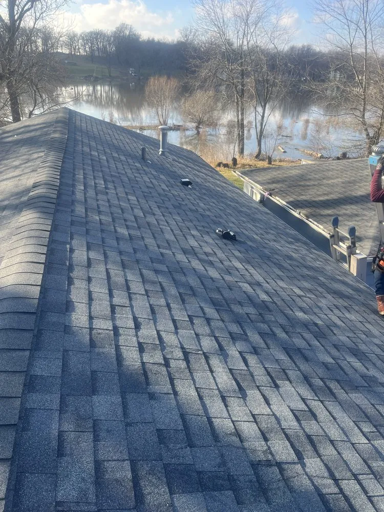 Slide of Costa Roofing