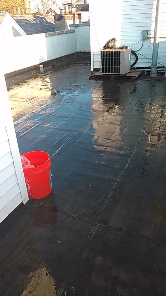 Slide of Costello Roofing