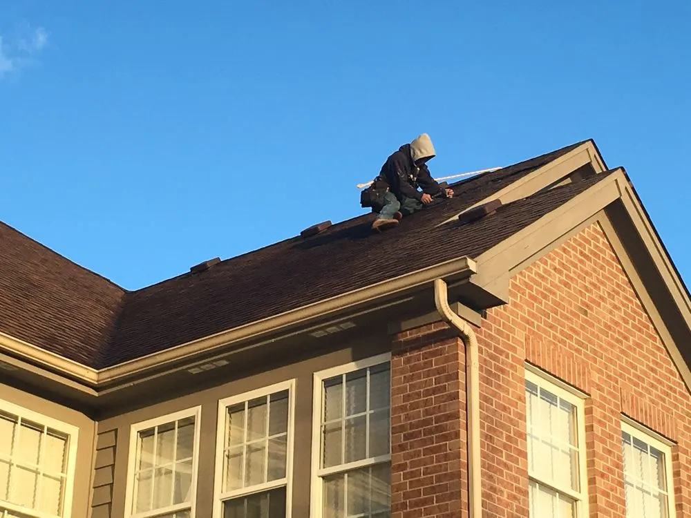 Slide of Costello Roofing