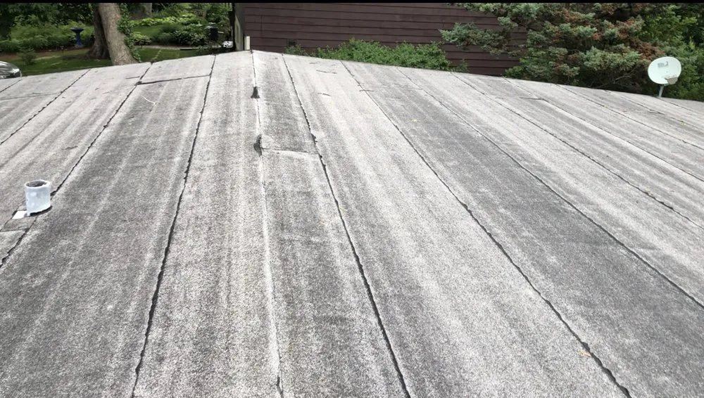 Slide of Costello Roofing