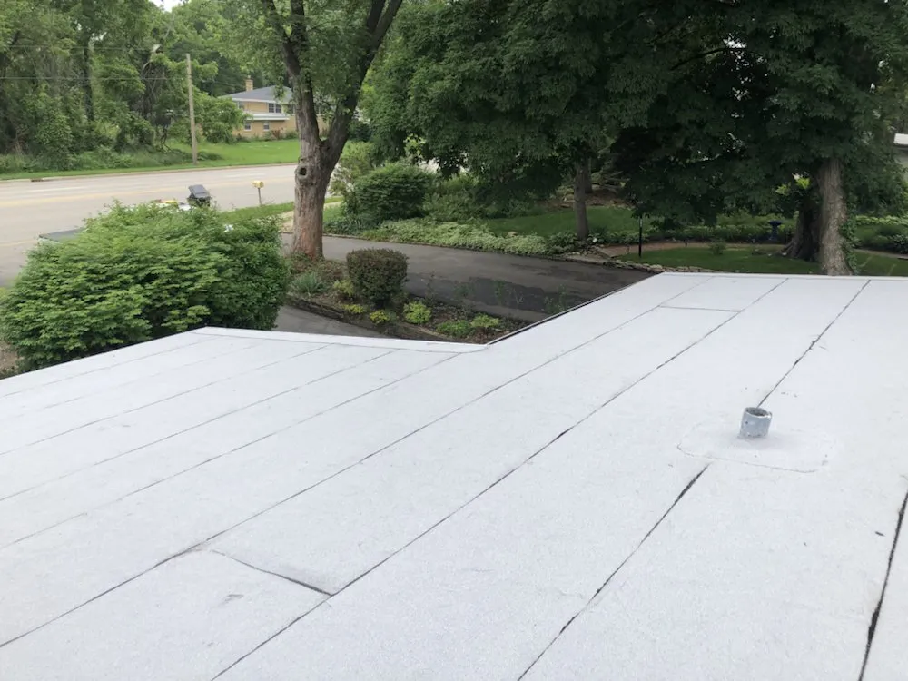 Slide of Costello Roofing