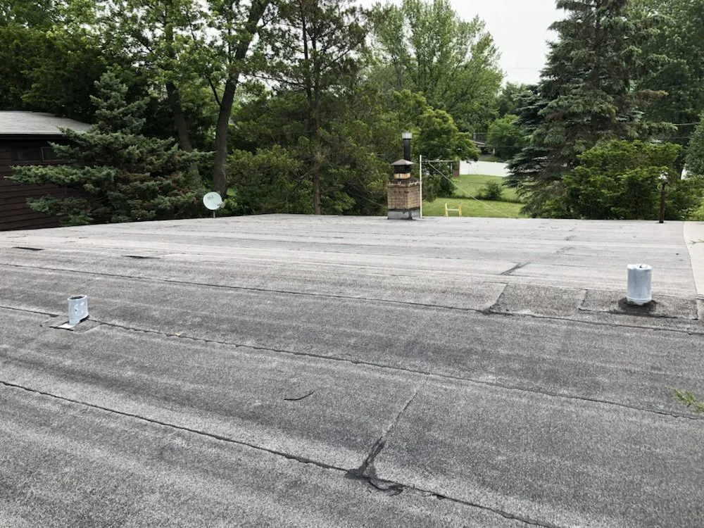 Slide of Costello Roofing