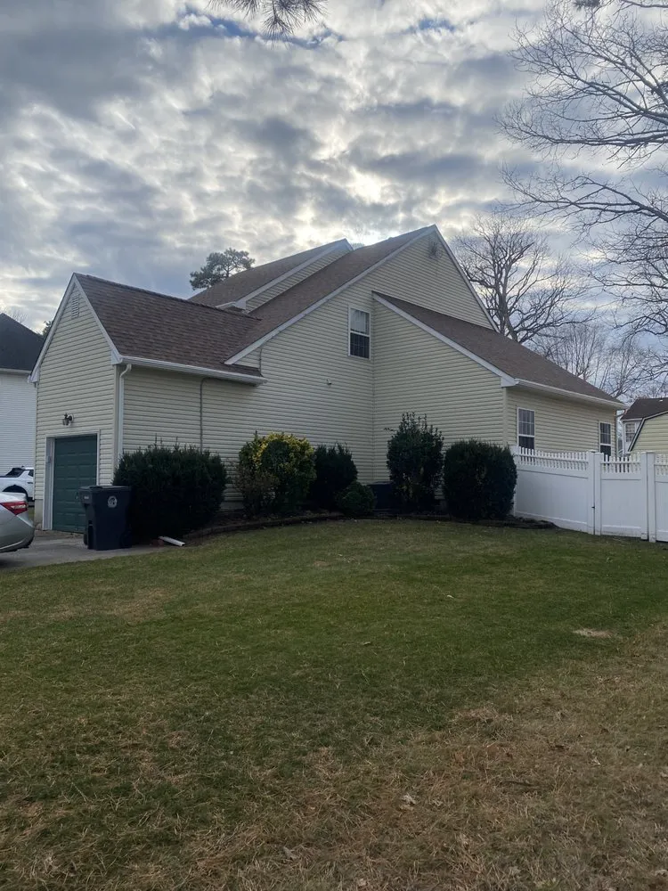Slide of Costello Roofing