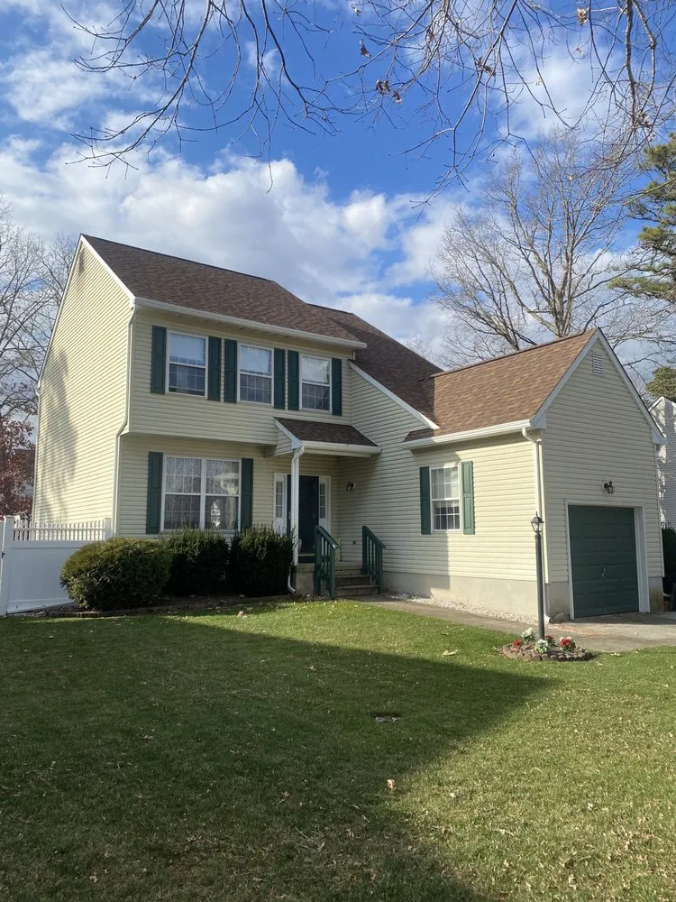 Slide of Costello Roofing