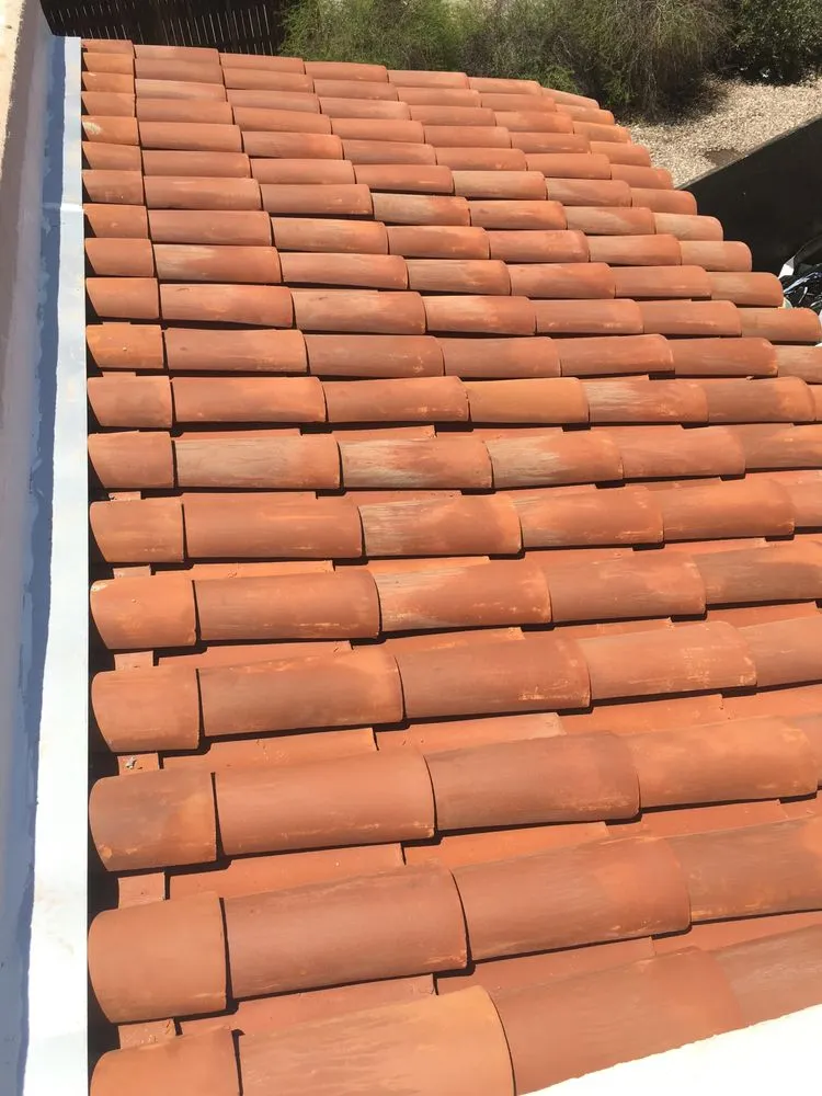 Slide of Cota Roofing