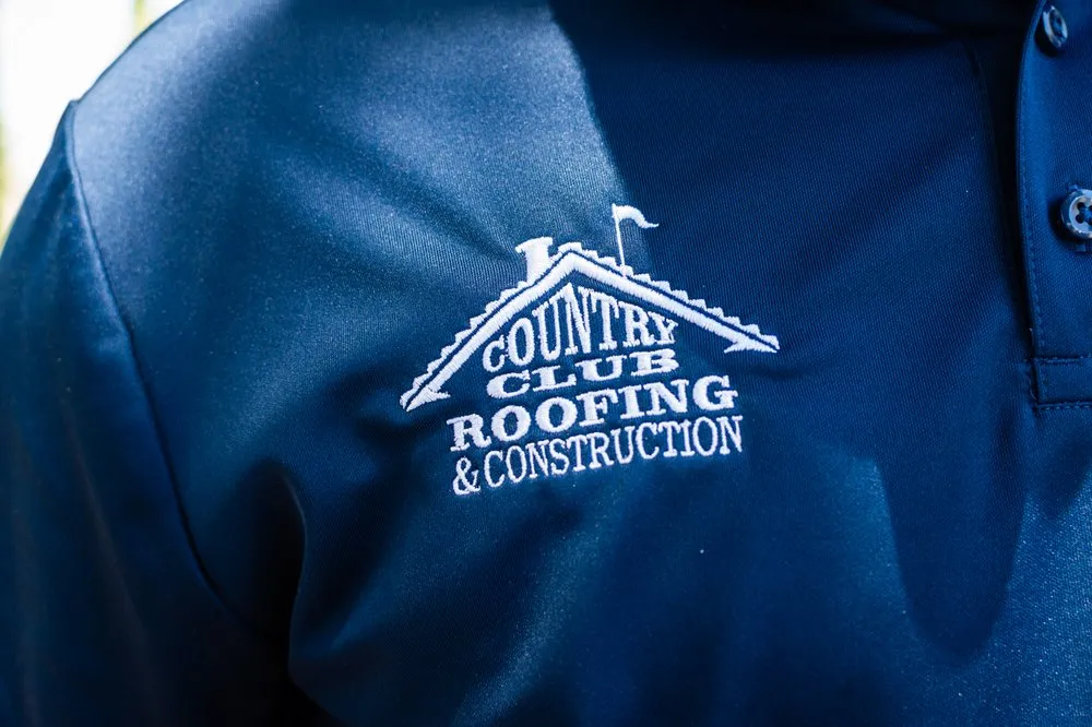 Slide of Country Club Roofing & Construction