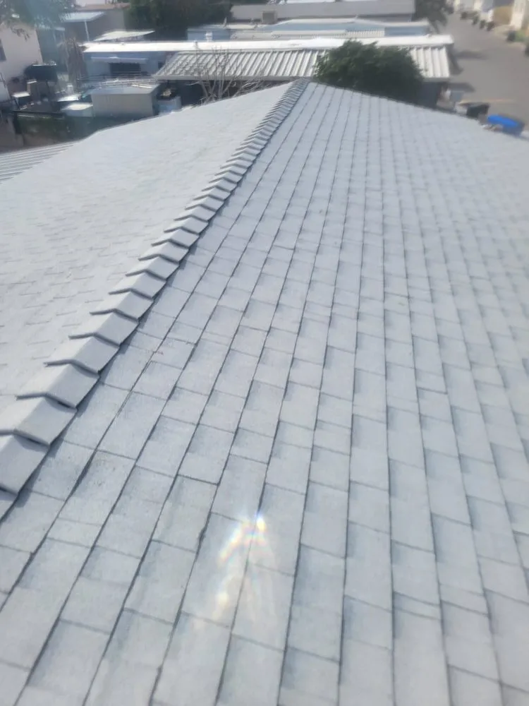 Slide of Courtesy Roofing Services