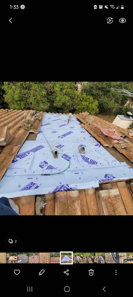 Slide of Courtesy Roofing Services