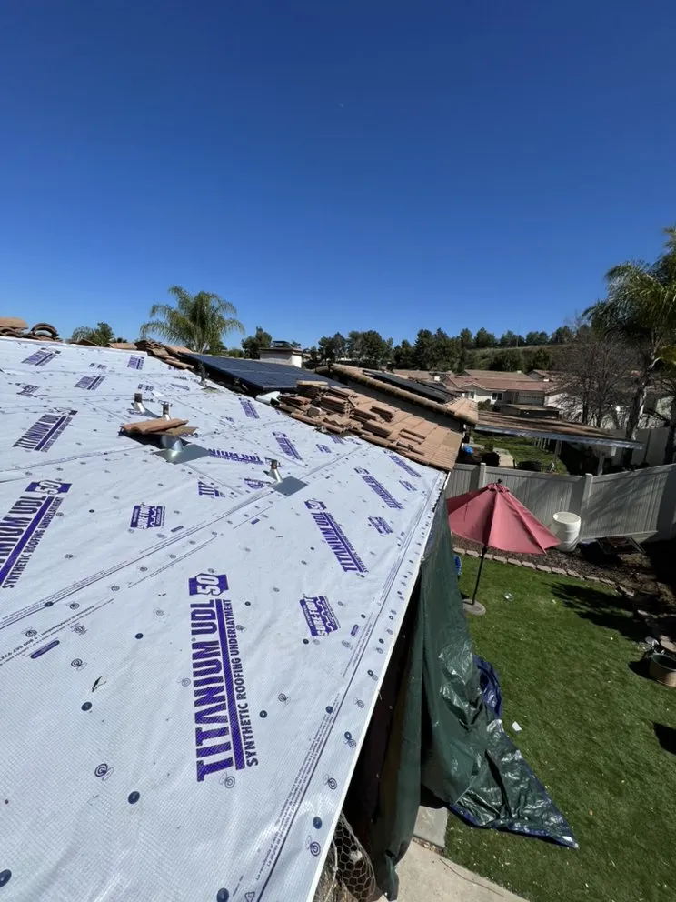 Slide of Courtesy Roofing Services