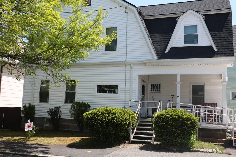 Slide of Couto Construction - Tewksbury