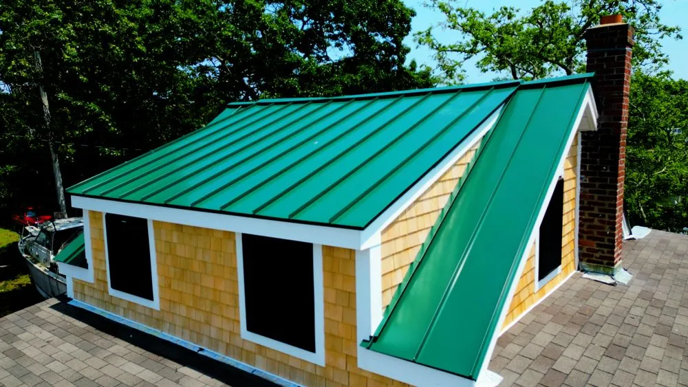 Slide of Couto Construction - Tewksbury