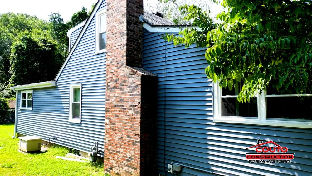 Slide of Couto Construction - Tewksbury