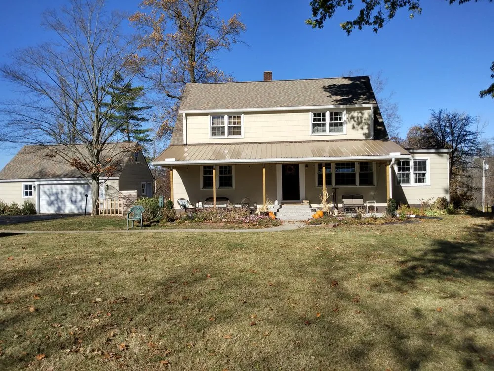 Slide of Coverall's Total Home Improvement Company