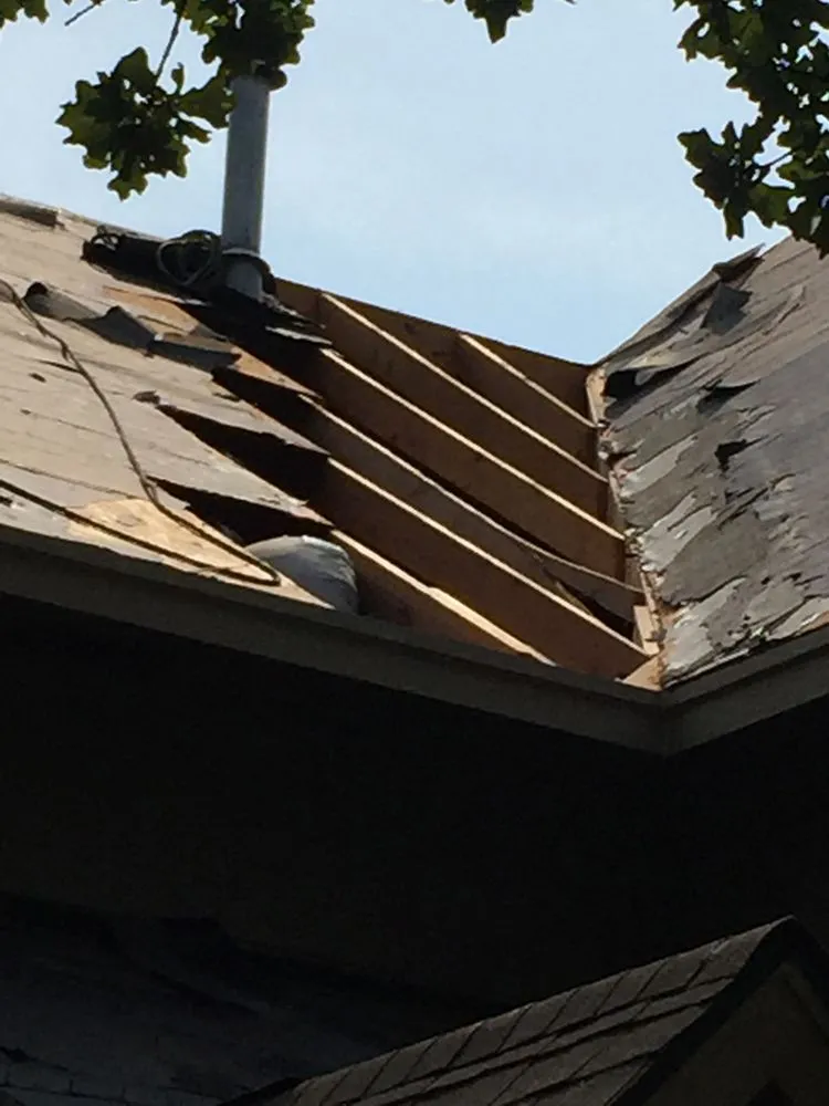 Slide of Cowboy Roofing