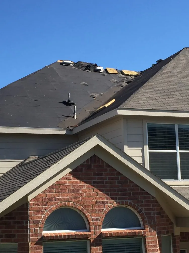 Slide of Cowboy Roofing