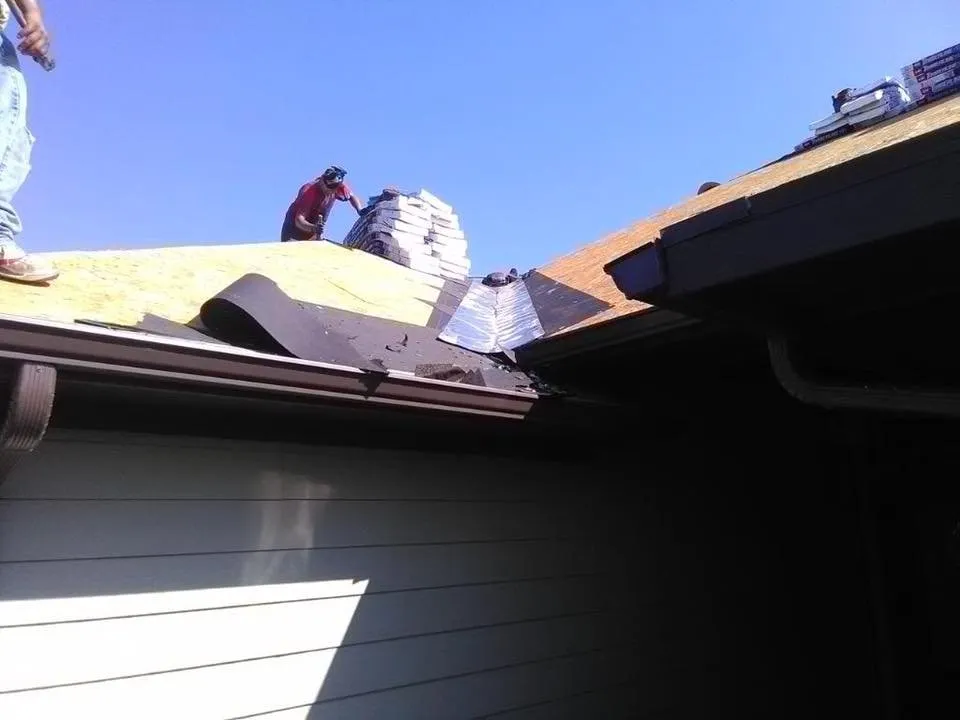 Slide of Cowboys Roofing