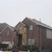 Slide of Cowboys Roofing