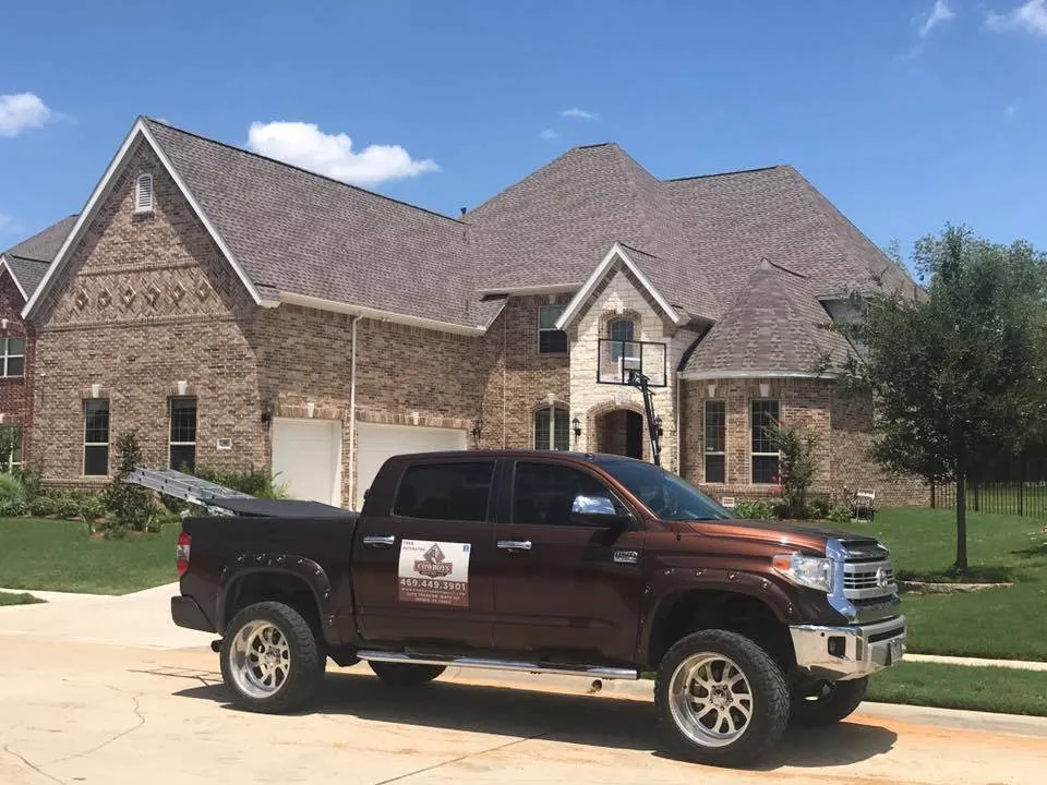 Slide of Cowboys Roofing