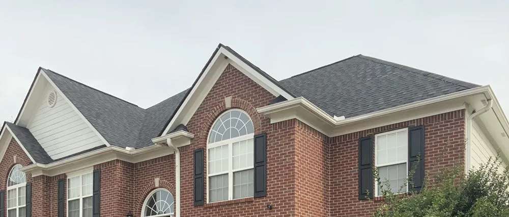Professional residential roofing service after storm damage in Sharpsburg, GA by Cowboys Vaqueros Construction