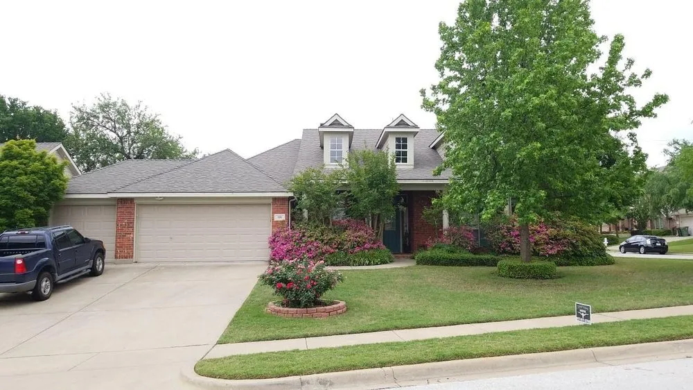 Slide of Cowtown Roofing