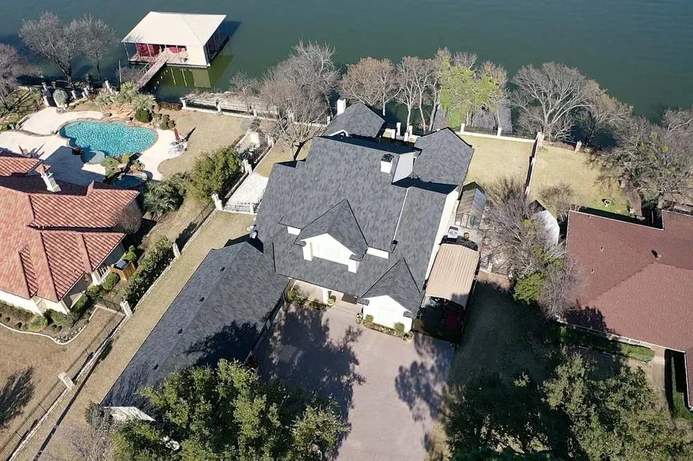 Slide of Cowtown Roofing