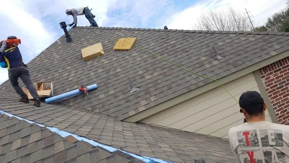 Slide of Cowtown Roofing