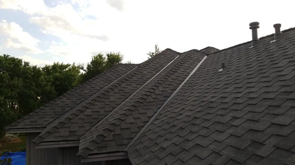 Slide of Cowtown Roofing