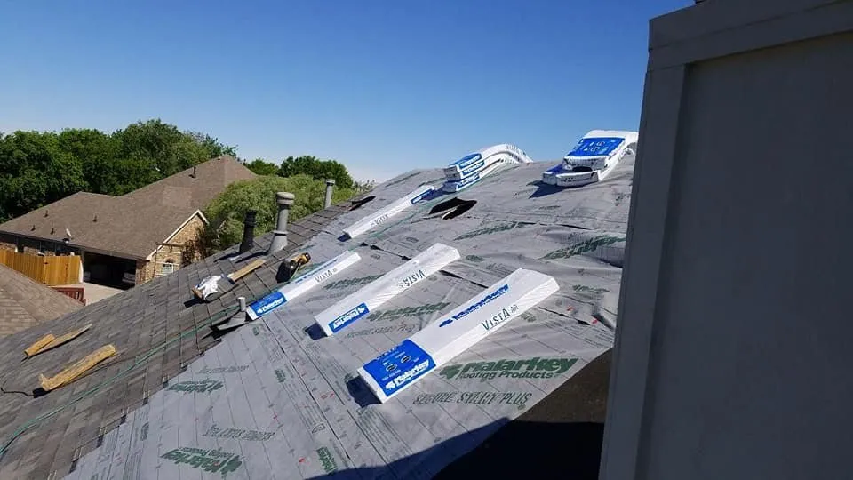 Slide of Cowtown Roofing