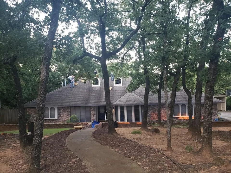 Slide of Cowtown Roofing