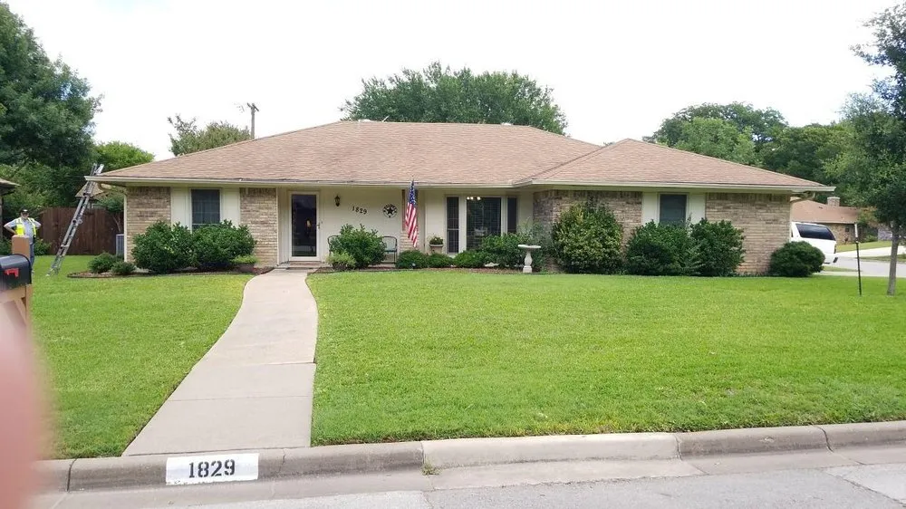 Slide of Cowtown Roofing